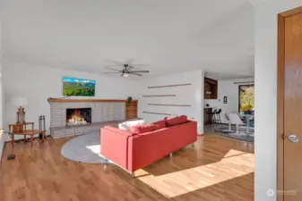 Walk into the living room area with hardwoods