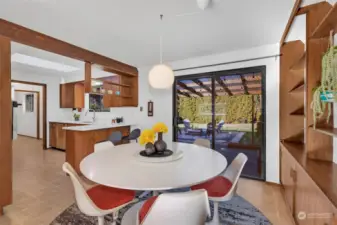 Dining area leading out to backyard