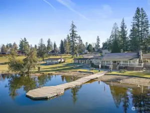 Cherokee Bay Club House with the dock and swimming area.