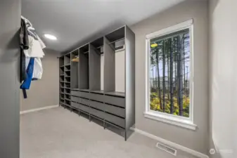 Owner's walk in closet with closet system