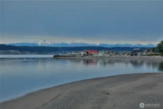 Mountain views and sandy beaches as the tide goes out