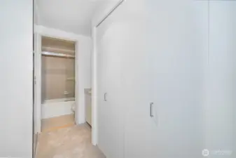 Entry to the en-suite bathroom, complete with generous closet space.