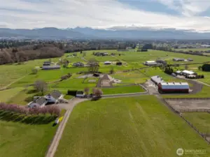 House is to the left , barn to the right. Such a great property.