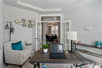 Lots of room for your home office space. French doors look into the entry hall and formal dining room.