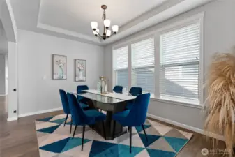 Lovely dining space! Or line the walls with shelves and add a couple of overstuffed chairs for a comfy library/reading nook.