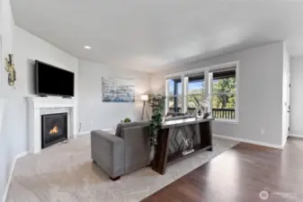 The hallway leads you to the living room/great room, complete with brand new carpeting.