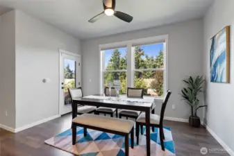 Another view of the eating nook and the door to the deck. Lots of natural light!