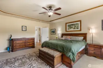 Primary Bedroom with beautiful crown molding & high ceilings!