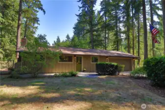 Your private retreat in the city. Nestled in the trees on a large 29,570 sq ft lot.