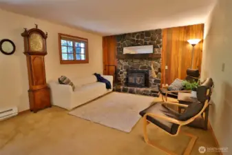 The warm and inviting living room welcomes you in.