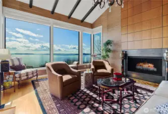 Gorgeous views day and night.  The living room features large picture windows to enjoy the view. The walls of windows and soaring ceilings are a signature of the renowned architect, George Suyama. This is a rare and very special home.