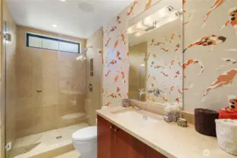 Guest bath upstairs, adjacent to the library.