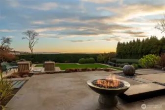 The backyard is another lovely place to entertain and to enjoy our beautiful weather. The alcove with heated lamps is just behind.