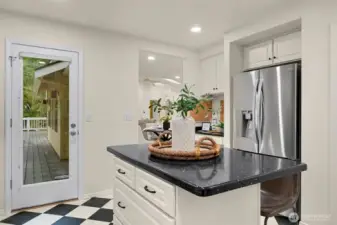 Kitchen island offers extra work space.