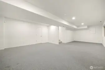 Huge downstairs family room for game or media room.