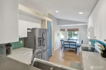 View from family room into kitchen.