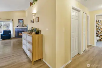 Hallway to utility room and all bedrooms and baths.