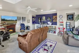 Bonus room has electric fireplace, also plumbed for gas.