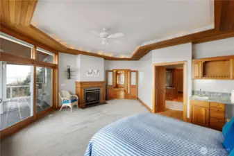 Wet bar, slider to spacious deck, gas fireplace