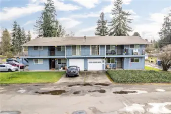 Two lower units have attached garages