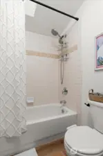 Skylight above shower provides beautiful natural light.