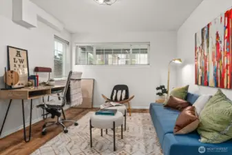 Main floor bonus room with closet, can be office, bedroom or den.