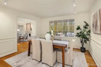 The formal dining room has plenty of room and stunning backyard views.