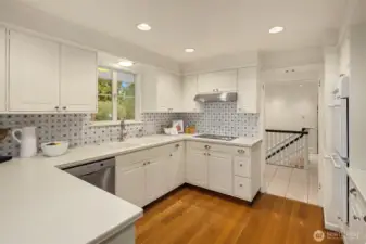 The updated chef's kitchen offers tons of storage and counter space.