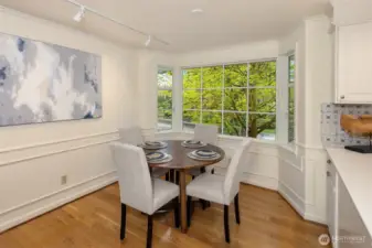 Serene views embrace the casual dining space.