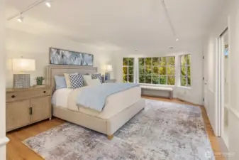 The primary bedroom boasts phenomenal sunrise, territorial, and Cascade foothill views.