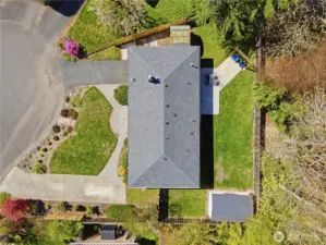 Ariel view highlights the cul-de-sac setting, spacious yard, and new roof (2026).