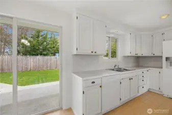 Plenty of cabinets and counter space with easy access to the patio and back yard.
