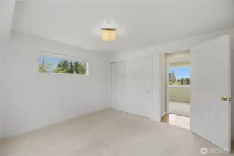 Large primary bedroom with double closet.
