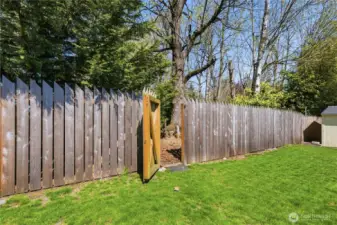 Back gate with private access to acres of walking trails.