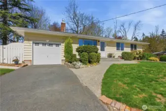 Charming rambler with great curb appeal, garage, and AC.
