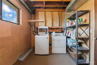 Laundry room located on lower level.  Plumbing is in place for a half bath to be added.