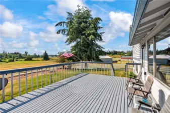 Back deck with view of barn