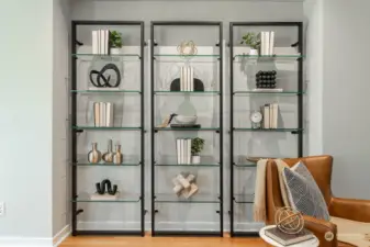 The built-in shelves in the living room are a great place to display your library or other collectibles.