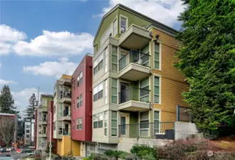 A rare find in the city, this corner residence not only boasts an expansive private patio tucked away up off the main street, the spacious shared rooftop terrace expands the outdoor offerings well beyond the vast majority of urban condominiums. Bask in the fresh air and warm, bright southern light.