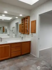The skylight lets in natural light and brightens the entire room with that wonderful sun.