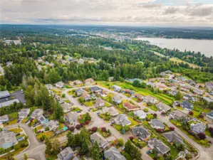 The house is centered, and you are looking north NE to Silverdale. The Port of Silverdale dock area is visible, and there are a few boats in Dyes Inlet.