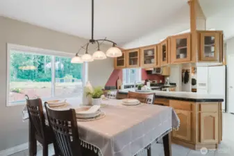 Whether you're cooking dinner or catching up over coffee, this open kitchen and dining space brings everyone together with ease.