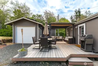 Spacious and tucked between the main house and detached garage, this patio is made for entertaining—BBQs, birthdays, or just a quiet evening under the stars.