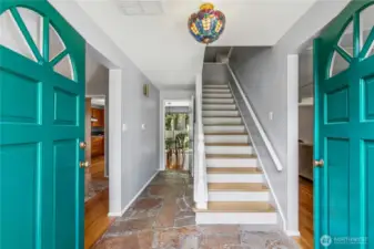 Come on in! Your entry sports stone on the floor, for its natural beauty and easy care.