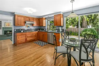 Your remodeled kitchen is ready for you to start cooking. There is plenty of storage here, and lots of light with the big slider to the back garden.