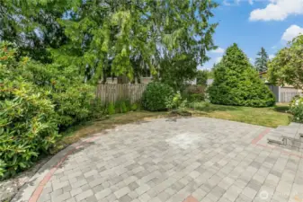 The pavers you saw on the driveway also grace the back garden patio.