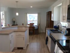 Dining room off kitchen with room for china hutch