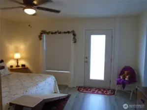 Primary Bedroom with Exterior door to Backyard