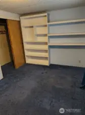 bedroom #2 with built-in shelves