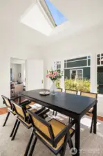 A true dining room off the kitchen for larger gatherings or a romantic dinner for two. Note the dramatic skylight.